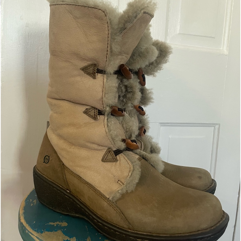 Born suede and shearling boot - worn once.  Warm and comfy. Cuter than UGS